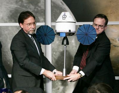 
NASA Administrator  Doug Cooke, left, and project manager Caris 
