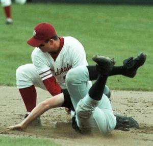 In this April 1998 SR file photo, North Idaho College second baseman Al Bevacqua turns his head away from the impact and tags out CSI's Mike Gillies, who was trying to steal, in the first inning. The first poem that Tom Wobker/The Bard of Sherman Avenue wrote for either Huckleberries or my old Hot Potatoes columns targeted the NIC trustee decision to abandon baseball and other sports. (Jesse Tinsley/SR file photo)