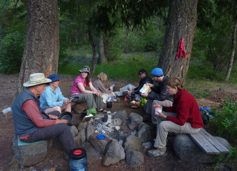 Spokane Mountaineers gather for dinner at a well-used campsite near the Wenaha River in the Wenaha-Tucannon Wilderness. 