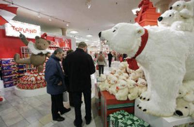 
Customers look over stuffed bears while visiting ToyLand at Macy's flagship store in New York. Department stores  are counting on more consumers to make them a top destination this season. 
 (Associated Press / The Spokesman-Review)