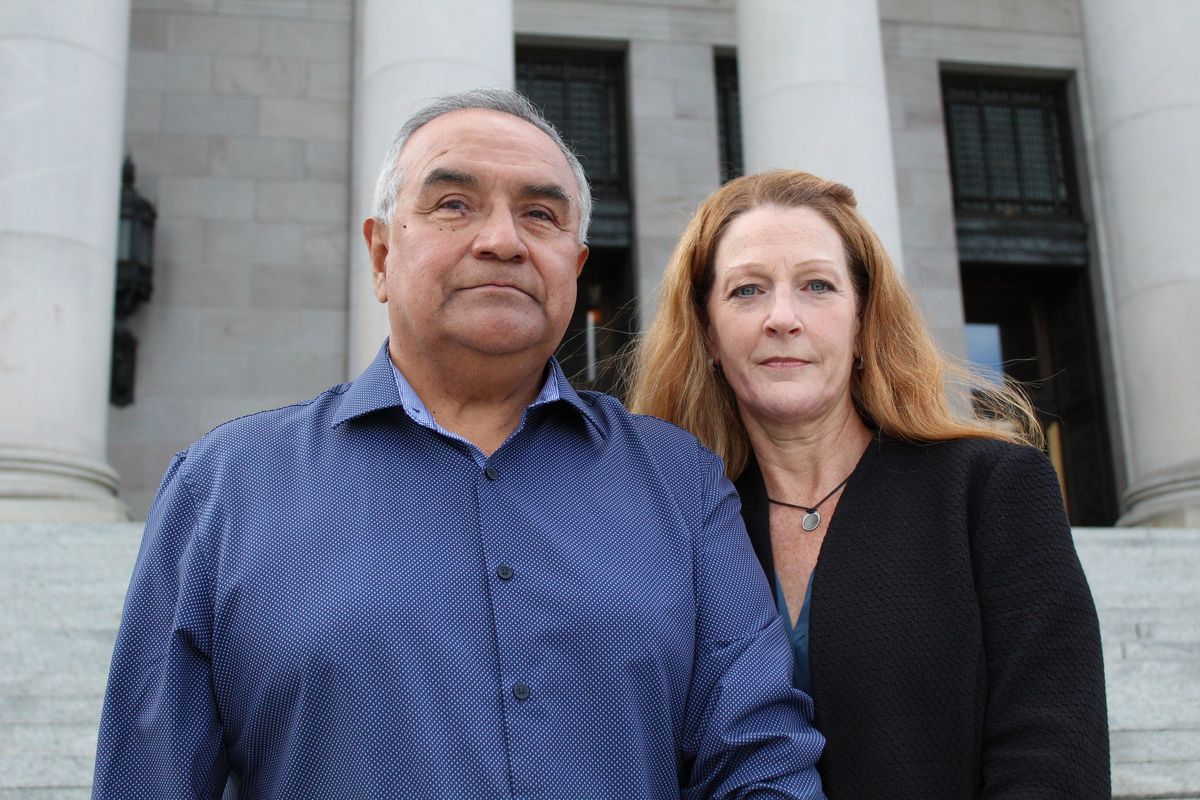 Hector Martinez and Jolayne Houtz, parents of Sam Martinez, in front of the Legislative Building in Olympia in March 2022.  (Albert James/The Spokesman-Review / The Spokesman-Review)