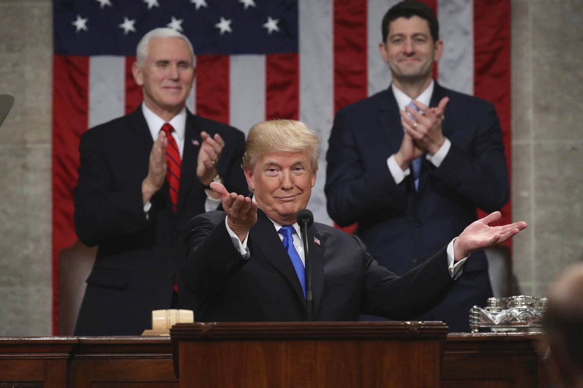 President Donald Trump gestures as delivers his first State of the Union address in the House chamber of the U.S. Capitol to a joint session of Congress Tuesday, Jan. 30, 2018 in Washington, as Vice President Mike Pence and House Speaker Paul Ryan applaud. (Win McNamee / Associated Press)