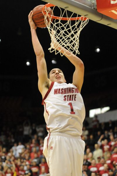 Klay Thompson, dunking Thursday against California, is tied with Aron Baynes as WSU’s top scorer. (Jesse Tinsley / The Spokesman-Review)