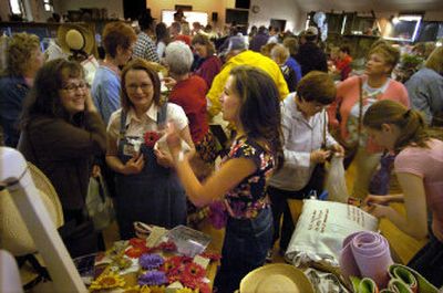 
Vendors at the 2004 Farm Chicks spring sale talk about the crush of customers at the Fairfield Grange. 
 (Christopher Anderson/The Spokesman-review / The Spokesman-Review)