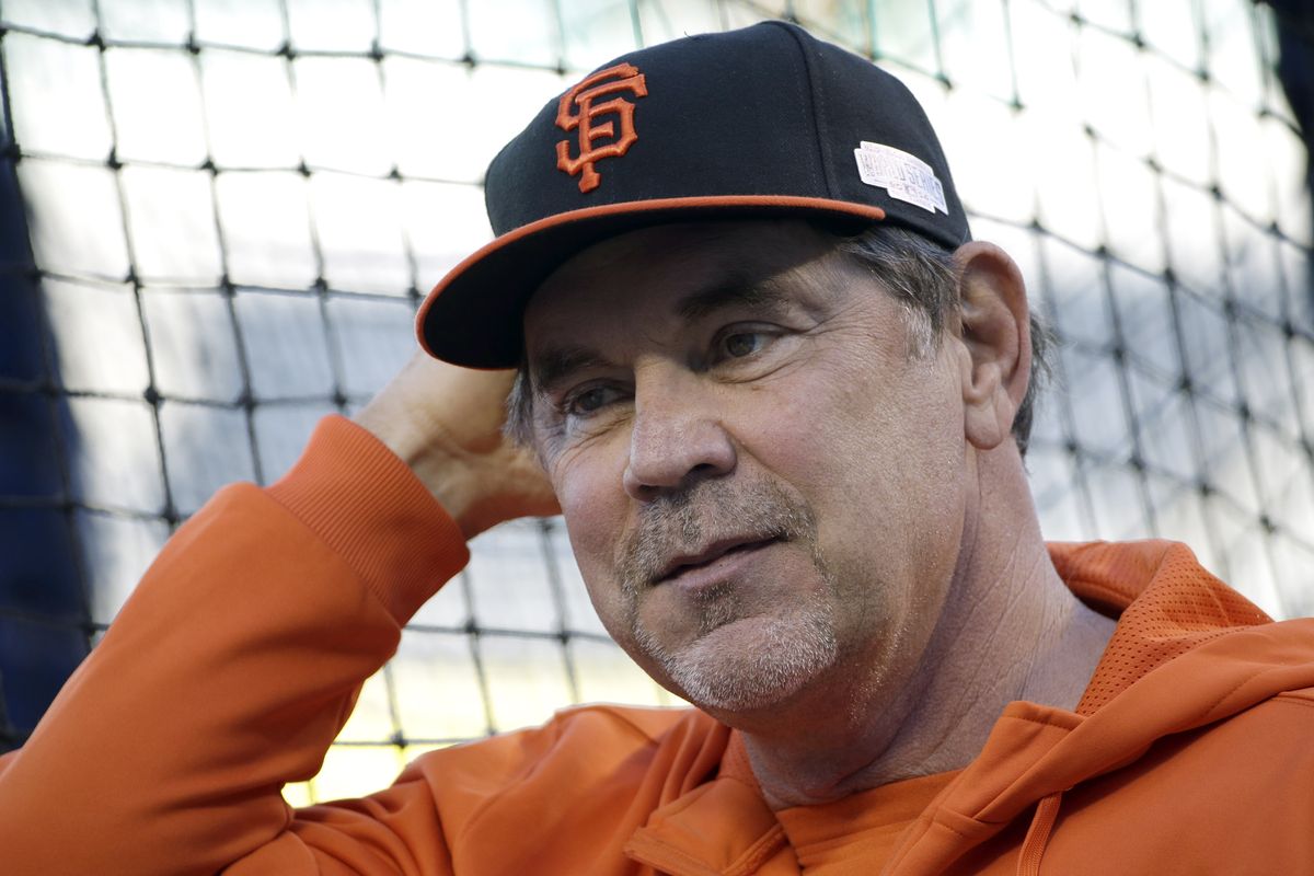 Manager Bruce Bochy watches his Giants get ready for today’s World Series opener. (Associated Press)