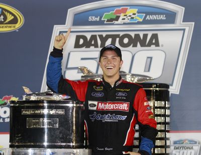 Trevor Bayne poses with the trophy after winning the Daytona 500 NASCAR auto race at Daytona International Speedway in Daytona Beach, Fla., Sunday, Feb. 20, 2011. (Associated Press / Fr60642 Ap)