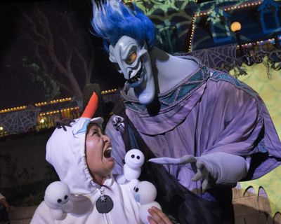 The sight of Hades from “Hercules,” at Disney’s “Mickey’s Halloween Party,” will scare anyone frozen. (Cindy Yamanaka Orange County Register)