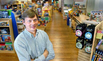 
Peter Christensen, owner of the Whiz Kids toy stores, poses in the River Park Square store Tuesday. Christensen just opened the third Whiz Kids store in Spokane. 
 (Joe Barrentine / The Spokesman-Review)