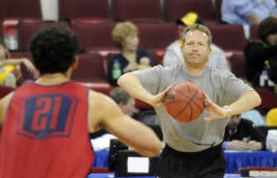 
Gonzaga assistant coach Ray Giacoletti works with Robert Sacre during Thursday's practice  in Raleigh, N.C. 
 (Dan Pelle / The Spokesman-Review)