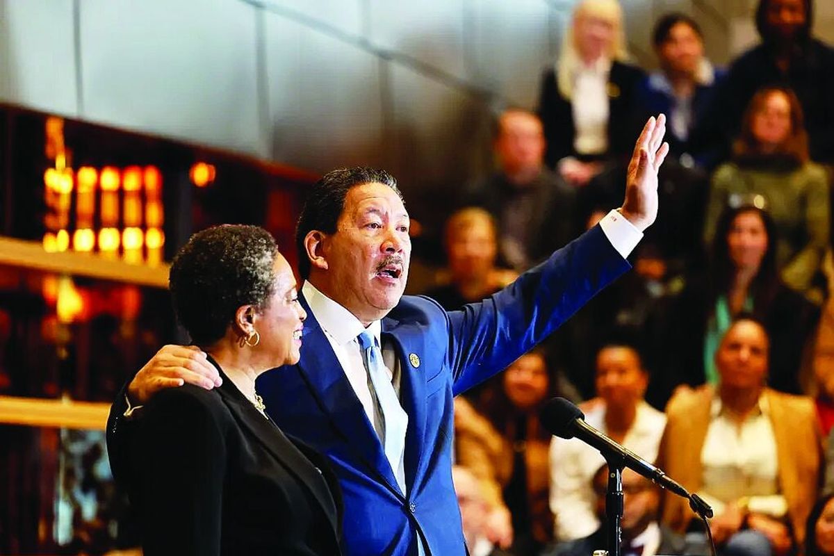 Mayor Bruce Harrell concedes the election Thursday at City Hall in Seattle. By his side is his wife, Joanne.  (Karen Ducey/Seattle Times)