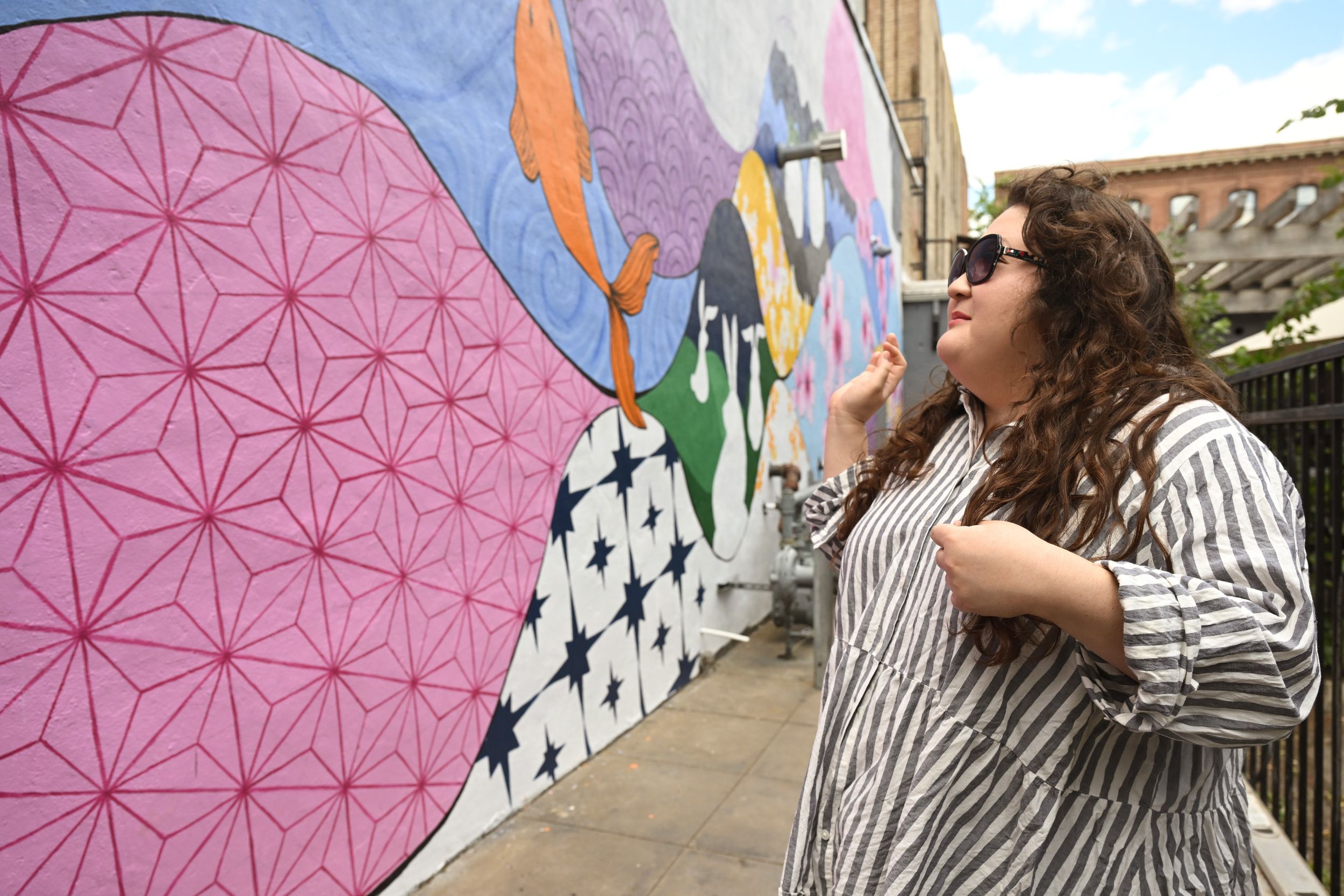 Artist Lisa Soranaka paints mural that honors Chinese, Japanese
