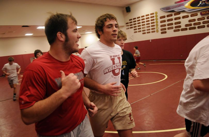Jake Laden, left, and Dustin Johnson enter their fourth season with University’s wrestling team.  (J. Bart Rayniak)