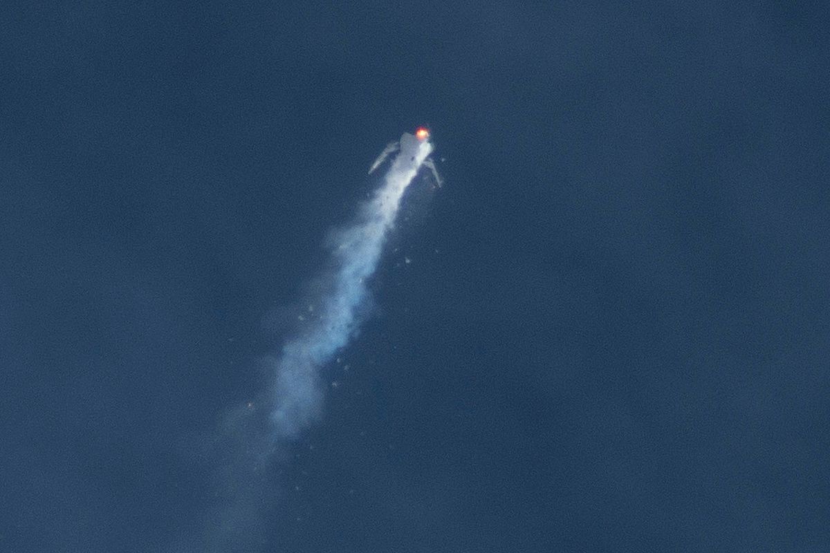 The Virgin Galactic SpaceShipTwo rocket explodes in midair during Friday’s test flight. (Associated Press)