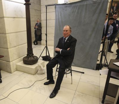 Former New York City Mayor Michael Bloomberg poses for his candidate photo as he files paperwork, Tuesday, Nov. 12, 2019, at the state Capitol in Little Rock, Ark., to appear on the ballot in Arkansas' March 3 presidential primary. Bloomberg hasn't formally announced a bid for the Democratic presidential nomination, but his trip to Arkansas is the latest indication that he is leaning toward a run. (Staton Breidenthal / Arkansas Democrat-Gazette)