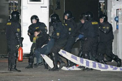 
Belarusian police detain protesters as they storm the opposition tent camp in the Belarusian capital of Minsk early this  morning. 
 (Associated Press / The Spokesman-Review)
