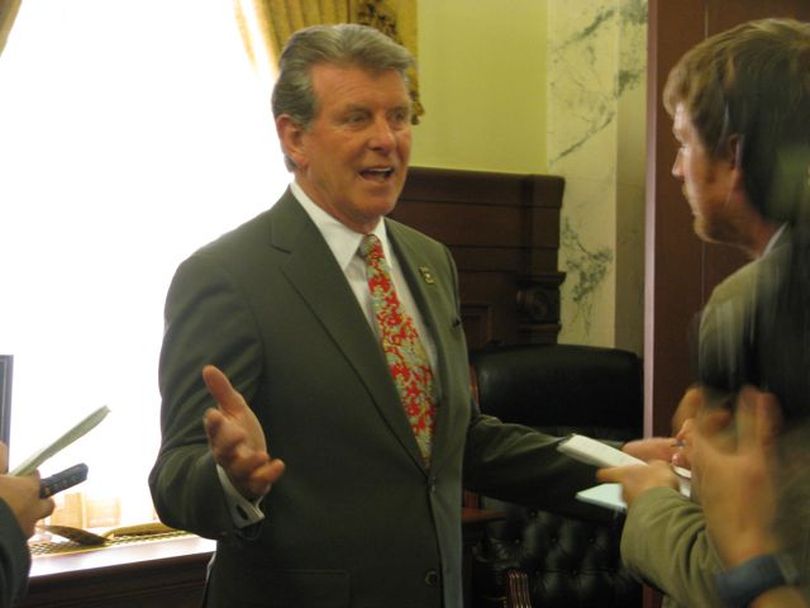 Gov. Butch Otter answers questions from reporters after his bill-signing Wednesday of HB 391a, the 