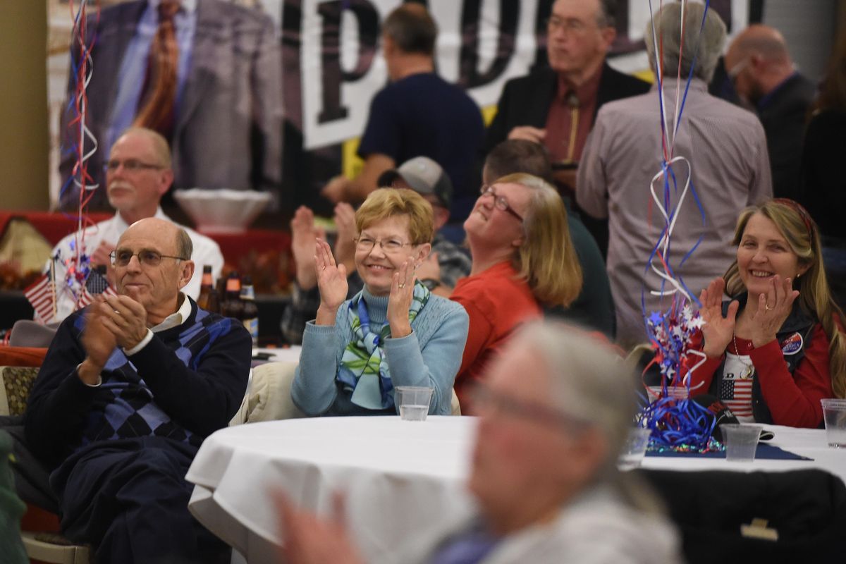 Local Republicans applaud statewide election results at CenterPlace in Spokane Valley, Tuesday, Nov. 8, 2016. The gathering was for local Donald Trump supporters to watch national election returns. (Jesse Tinsley / The Spokesman-Review)