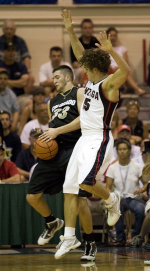 Gonzaga’s Matt Bouldin, right, a Colorado native, fights for a rebound with one of his Colorado friends, forward Austin Dufault. (Associated Press)