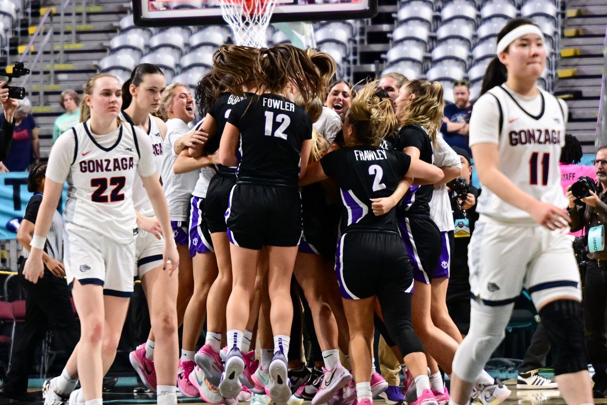 The Portland Pilots react after defeating the Gonzaga Bulldogs during the second half of a WCC tournament championship basketball game on Tuesday, March 7, 2023, at the Orleans Arena in Las Vegas, Nev. The Portland Pilots won the game 63-60.  (Tyler Tjomsland/The Spokesman-Review)