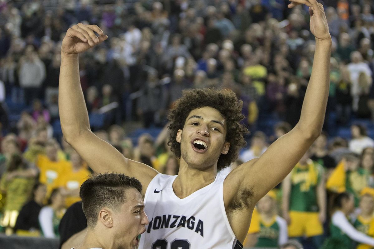 Gonzaga Prep’s Anton Watson celebrates after hitting the winning shot in overtime against Richland in the State 4A boys basketball tournament March 2, 2018, at the Tacoma Dome. Gonzaga Prep won 53-50 to advance to the championship game. (Patrick Hagerty / For The Spokesman-Review)