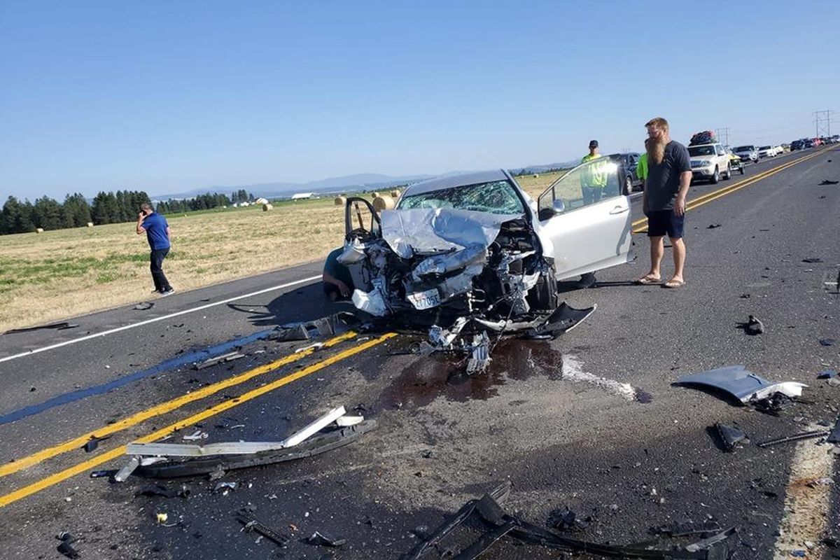 A multi-vehicle collision closed Highway 395 in both directions 9 miles north of Spokane Tuesday evening. One of the drivers involved in was arrested on a charge of vehicular assault and is suspected of driving under the influence, court records show. (Diana Vasquez, Courtesy)