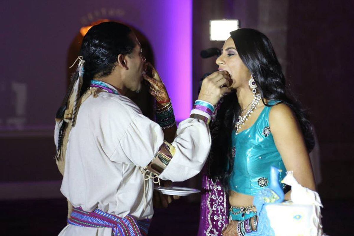 Rob Jacobs, with wife Payal Patel-Jacobs, violated the Bald Eagle Protection Act by wearing eagle feathers at his wedding.