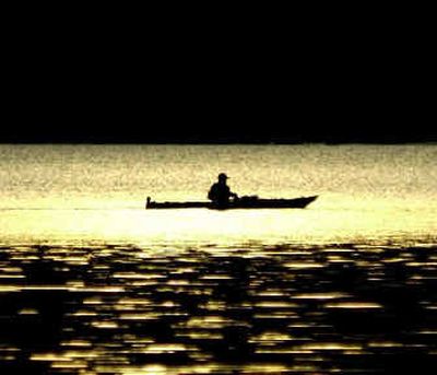 
This could be you enjoying an early evening paddle on one of the region's many lakes. 
 (File/ / The Spokesman-Review)