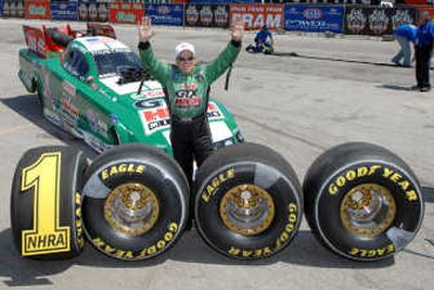 
Funny Car driver John Force commemorates his 1,000th round win, a mark never reached before.Associated Press
 (Associated Press / The Spokesman-Review)