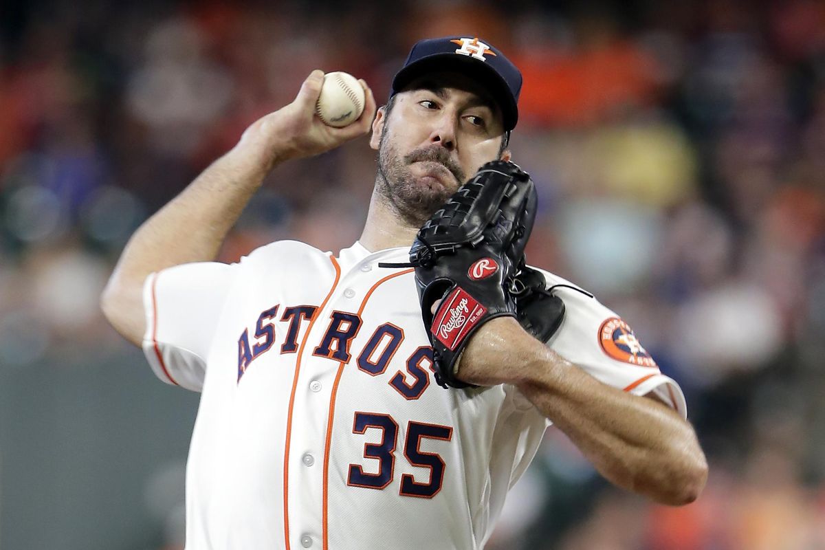 In this July 24, 2019 photo, Houston Astros starting pitcher Justin Verlander throws to an Oakland Athletics batter during a baseball game in Houston. Verlander has been awarded his second AL Cy Young Award. (Michael Wyke / Associated Press)