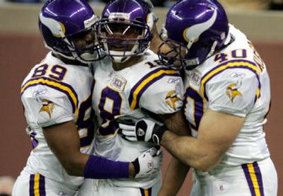 
Minnesota, with the play of receiver Koren Robinson, center, is in the mix for an NFC wild-card berth. 
 (Associated Press / The Spokesman-Review)