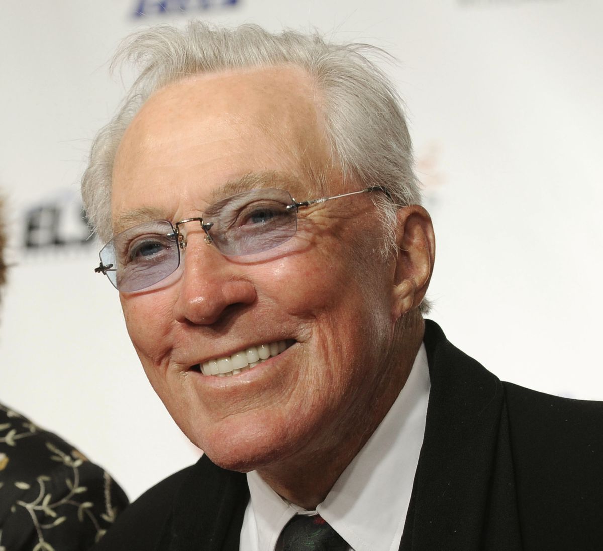 FILE - This Feb. 6, 2009 file photo shows Andy Williams arriving at the MusiCares Person of the Year tribute in Los Angeles. Williams, who had a string of gold albums and hosted several variety shows and specials such as, "The Andy Williams Show," died Tuesday, Sept. 25, 2012, at his home in Branson, Missouri, following a yearlong battle with bladder cancer, his Los Angeles-based publicist, Paul Shefrin, said Wednesday. He was 84. (Chris Pizzello / Associated Press)