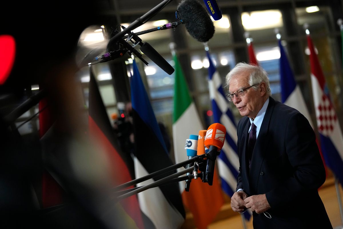 European Union foreign policy chief Josep Borrell speaks with the media as he arrives for a meeting of EU foreign ministers at the European Council building in Brussels on Monday, Dec. 13, 2021. European Union foreign ministers met Monday to discuss how to thwart the threat of a possible new Russian invasion of Ukraine and what measures to take should Moscow decide to send its troops across the border.  (Virginia Mayo)