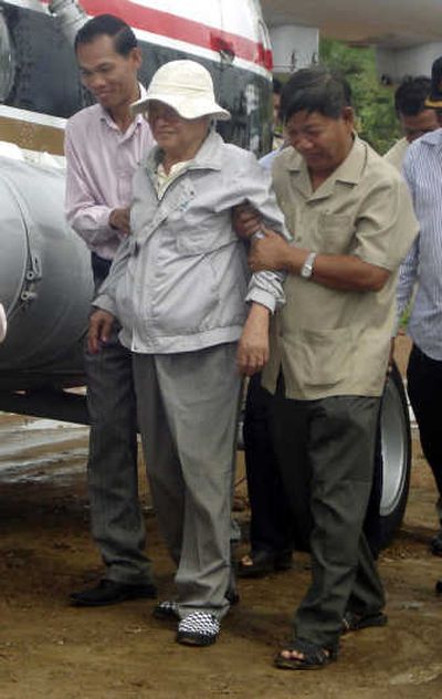 
Former Khmer Rouge head of state Khieu Samphan, center, seen Wednesday, was taken into custody Monday.Associated Press
 (Associated Press / The Spokesman-Review)