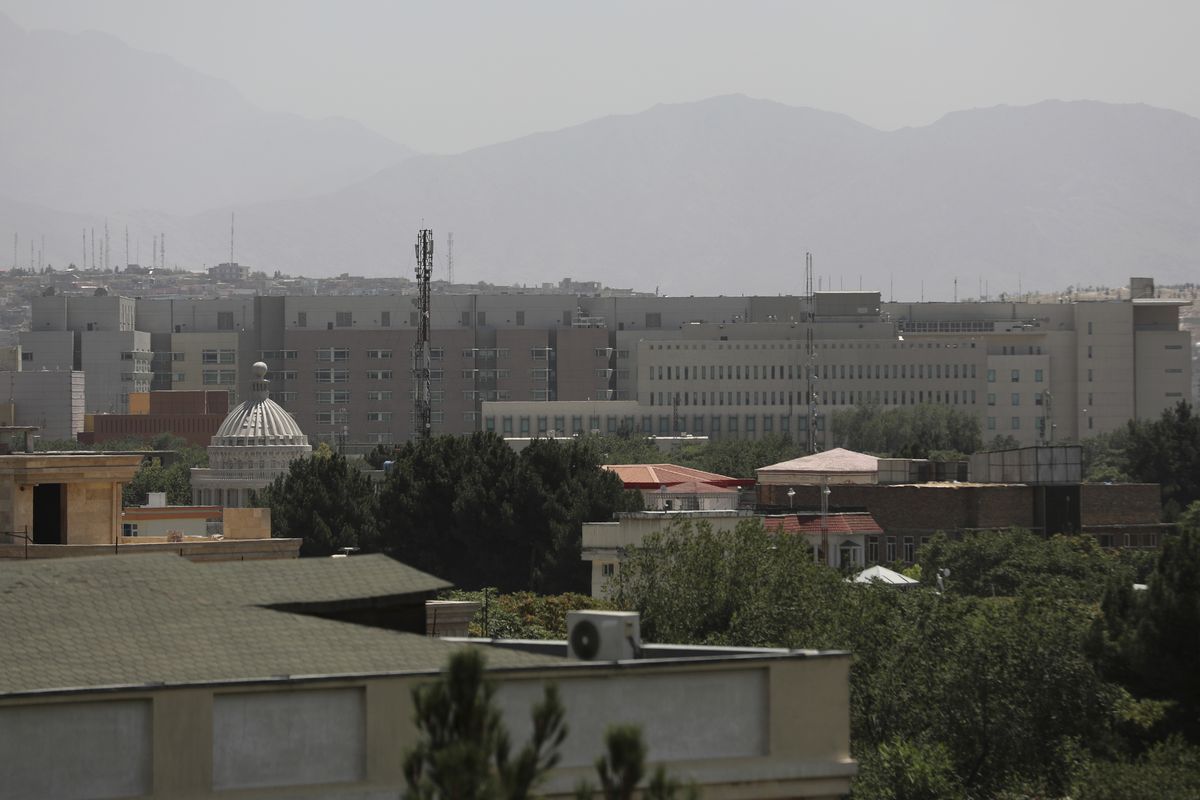 The U.S. Embassy buildings are seen in Kabul, Afghanistan, Saturday, Aug. 14, 2021. The last-minute decision to send 3,000 U.S. troops to Afghanistan to help partially evacuate the U.S. Embassy is calling into question whether President Joe Biden will meet his Aug. 31 deadline for fully withdrawing combat forces. The vanguard of a Marine contingent arrived in Kabul on Friday and most of the rest of the 3,000 are due by Sunday.  (Rahmat Gul)