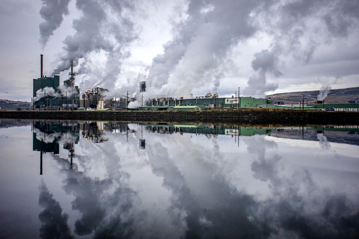 Exhaust from the Clearwater Paper Mill reflects on the surface of the Clearwater River on Thursday, Dec. 1, 2023.  (August Frank/The Lewiston Tribune)