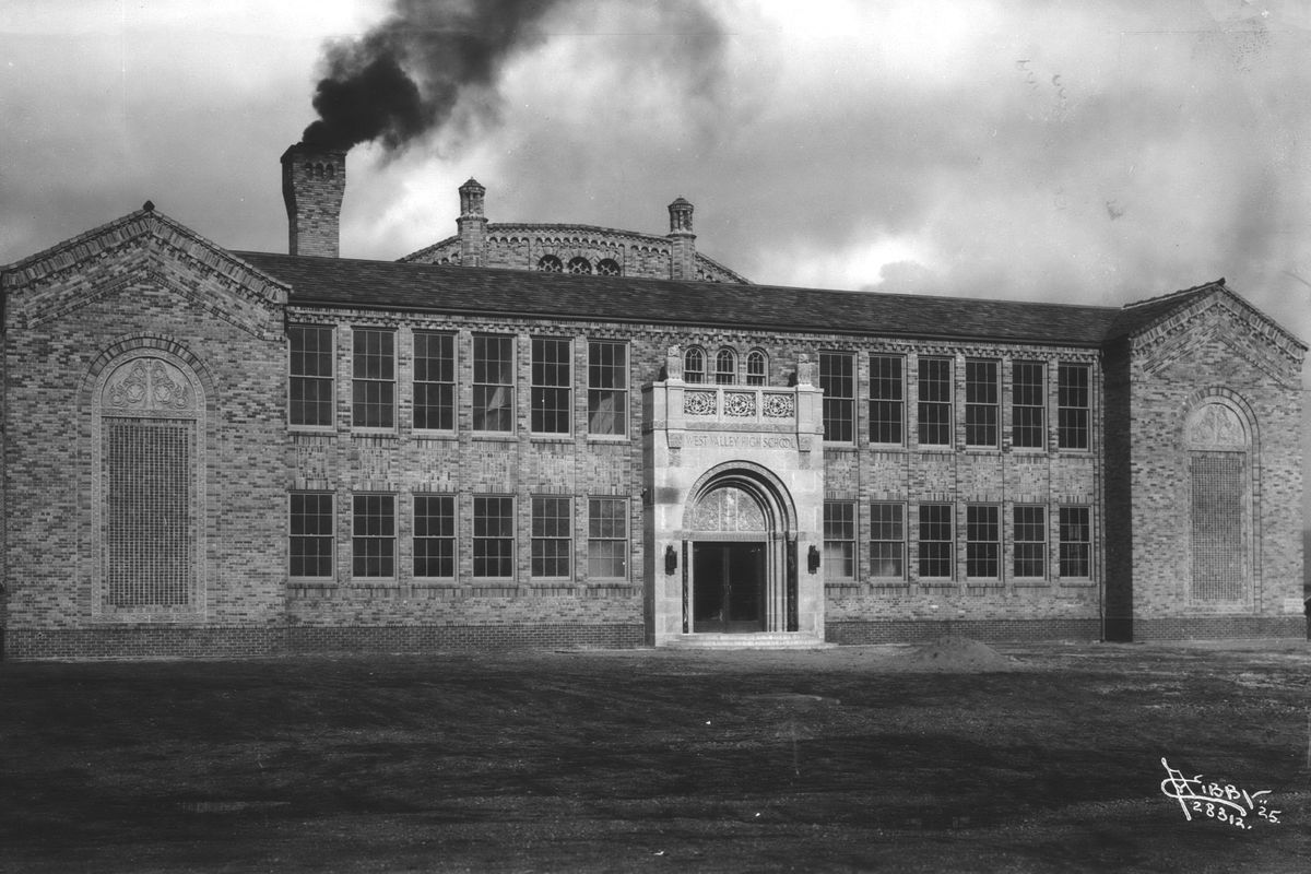 1925: West Valley High School was created by a merger of smaller school districts in the Spokane Valley area in 1924. The school was located at Trent Avenue and Argonne Road. The building was replaced with a new campus at Buckeye Avenue and Vista Road, about three blocks away, in 1957. The old building became Argonne Junior High in 1962. This building was torn down in 1992 and became the location of an Albertson’s supermarket and shopping center.  (Northwest Room/Spokane Public Library)