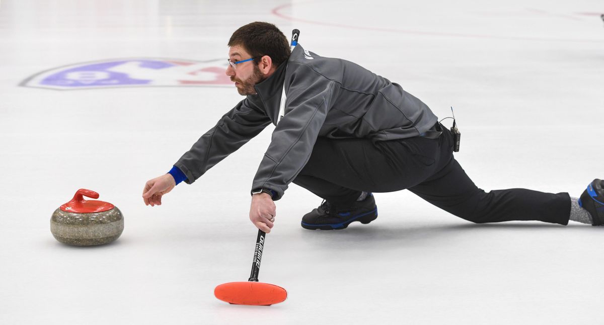 Matt Moore, of the Inland Northwest Curling Club, throws a stone during a demonstration, Wednesday, Jan. 2020, at the EWU Recreation Center in Cheney, Wash. (Dan Pelle / The Spokesman-Review)