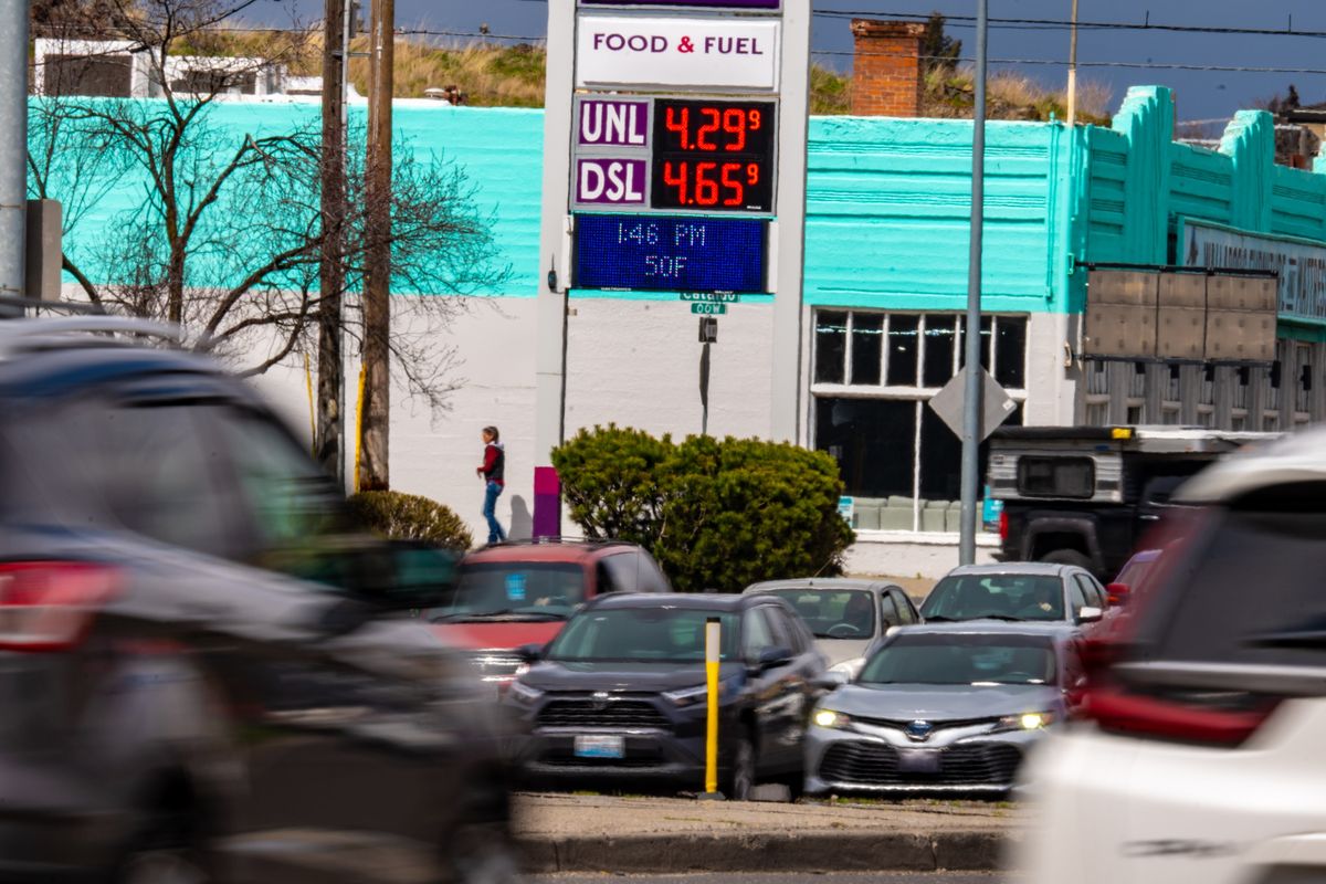 Cars stream by the Nom Nom Food and Fuel on North Division, Wed. April 19, 2023. The cost of gas has been rising sharply over the last month in Spokane with prices rapidly crossing over the $4.00 mark in just the last week.  (COLIN MULVANY/THE SPOKESMAN-REVI)