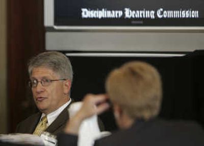 
Durham County District Attorney Mike Nifong testifies during his State Bar trial in Raleigh, N.C., on Friday. Nifong faces several ethics charges tied to his handling of the Duke lacrosse rape case. Associated Press
 (Associated Press / The Spokesman-Review)