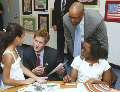 Prince Harry and Prince Seeiso of Lesotho speak to students at the Harlem Children’s Zone school in New York on Saturday.  (Associated Press / The Spokesman-Review)