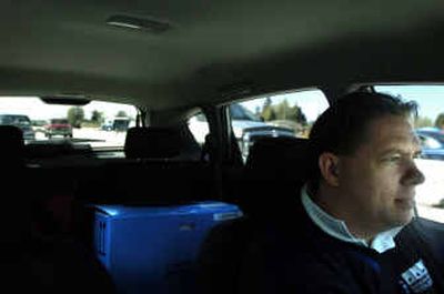 
Courier Michael Roe travels through Spokane Valley on his way to Montana to pick up blood, urine, skin and semen samples for Pathology Associates Medical Laboratories on Friday afternoon. 
 (Holly Pickett / The Spokesman-Review)