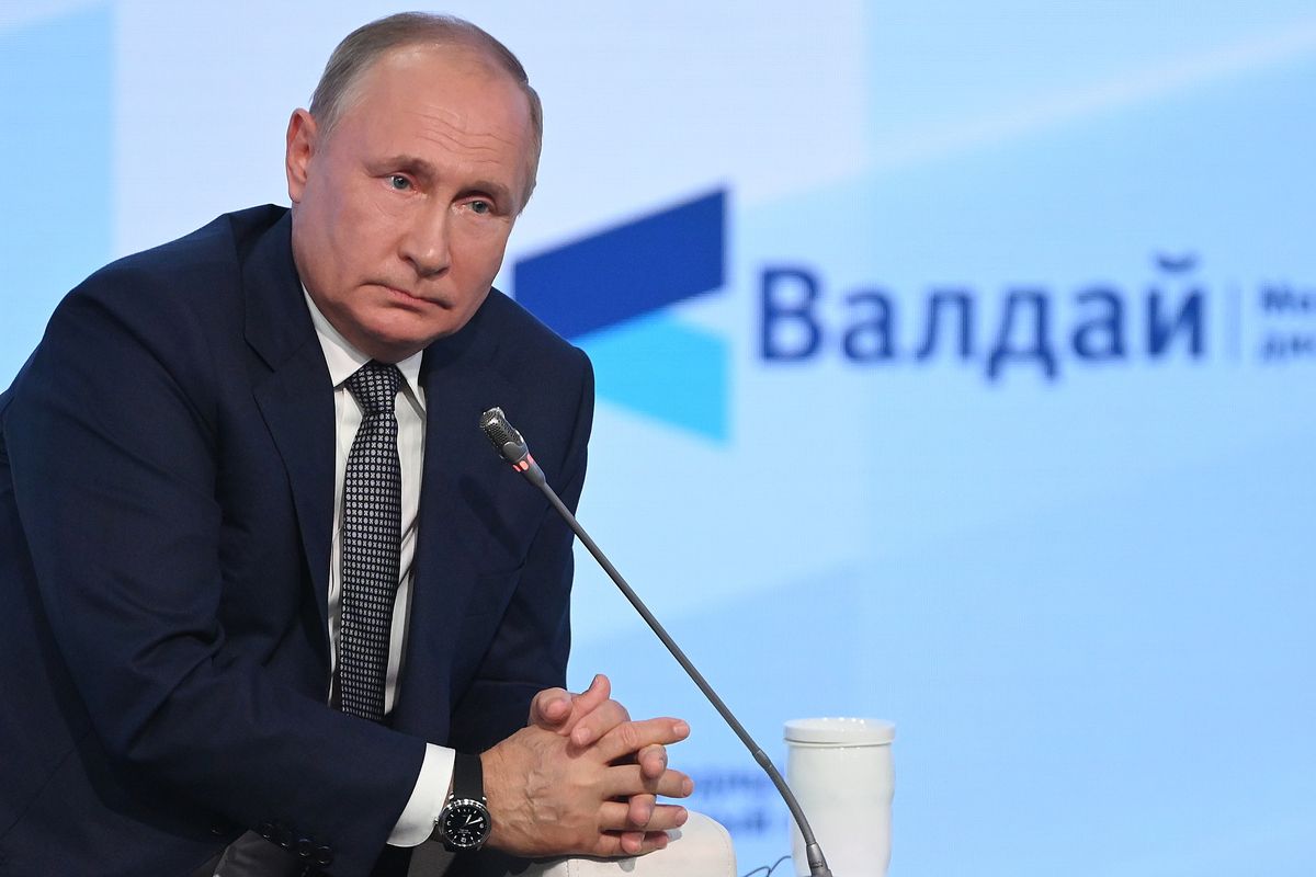 Russian President Vladimir Putin gestures attends the annual meeting of the Valdai Discussion Club in the Black Sea resort of Sochi, Russia, Thursday, Oct. 21, 2021. President Vladimir Putin has voiced consternation about Russians
