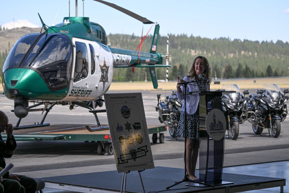Spokane County Commissioner Mary Kuney, now Brooks, speaks at the commissioning ceremony for the Spokane County Sheriff’s Air Support Unit new helicopter at the sheriff’s department hangar June 4 at Felts Field.  (Jesse Tinsley/THE SPOKESMAN-REVIEW)