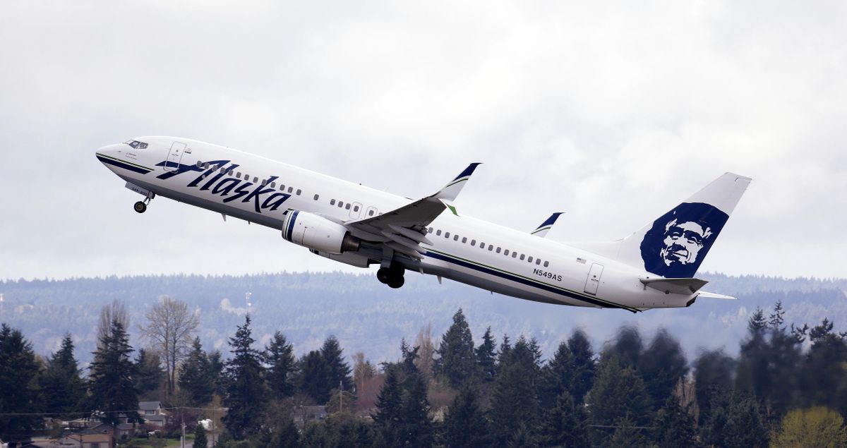 FILE - In this Tuesday, March 24, 2015 file photo, an Alaska Airlines jet takes off at Seattle-Tacoma International Airport in SeaTac, Wash. (Elaine Thompson / AP)