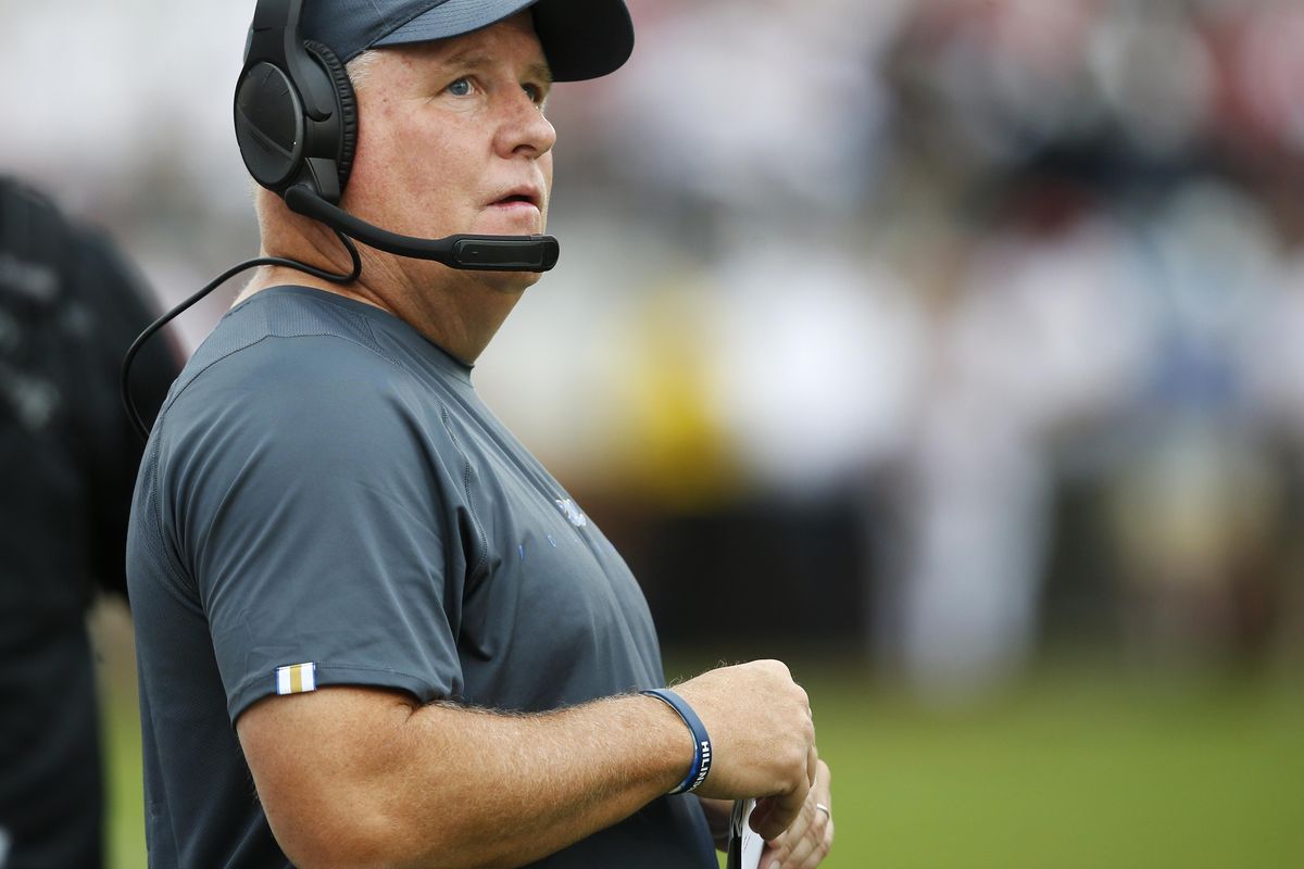 In this Sept. 8, 2018, file photo, UCLA head coach Chip Kelly stands during a  game between his Bruins and Oklahoma in Norman, Okla. Kelly is among the first-year head coaches who are struggling to start the season. The Bruins dropped to 0-3 with their 38-14 home loss to Fresno State. (Sue Ogrocki / AP)