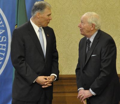 OLYMPIA -- Gov. Jay Inslee talks with former Gov. John Spellman in the office conference room on Tuesday, April 21, 2015. (Jim Camden/Spokesman-Review)
