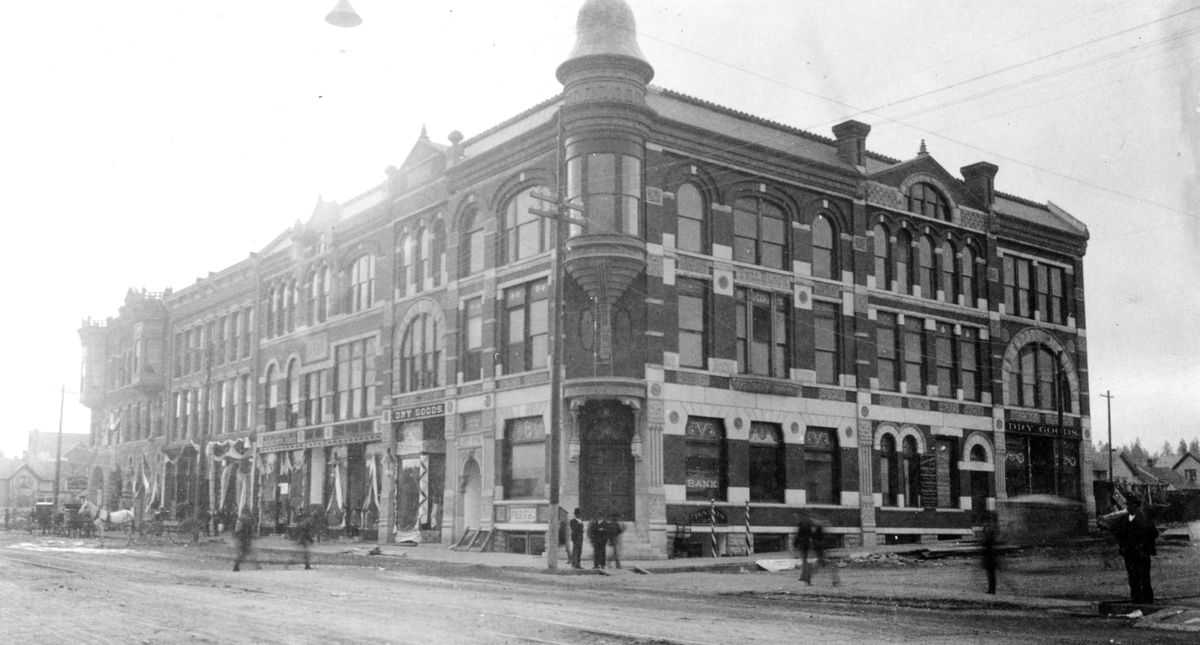 <b>1888:</b> The Tull Block, right, is pictured before the Great Fire of 1889. It was built by Francis Marion Tull, who moved to Spokane Falls in 1887. After the fire, Tull replaced the building with a five-story structure version. Photo courtesy of Spokane Public Library, Northwest Room. (Spokane Public Library, Northwest Room courtesy)