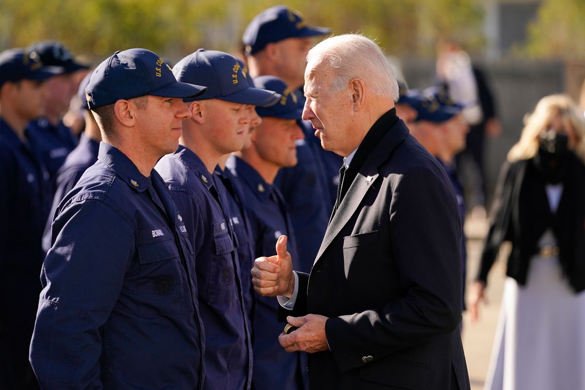 President Joe Biden speaks with members of the coast guard as he visits the United States Coast Guard Station Brant Point in Nantucket, Mass., Thursday, Nov. 25, 2021.  (Carolyn Kaster)