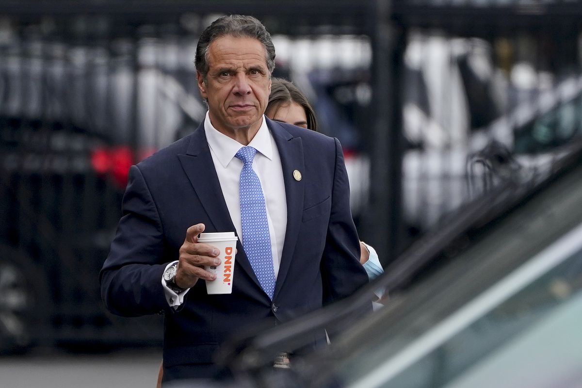 FILE - New York Gov. Andrew Cuomo prepares to board a helicopter after announcing his resignation, Tuesday, Aug. 10, 2021, in New York. Cuomo will resign in disgrace this week. His departure comes after a state investigation found he sexually harassed 11 women. It