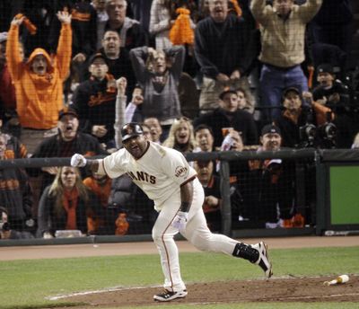 Giants’ Pablo Sandoval reacts after hitting a two-run double in the sixth.  (Associated Press)